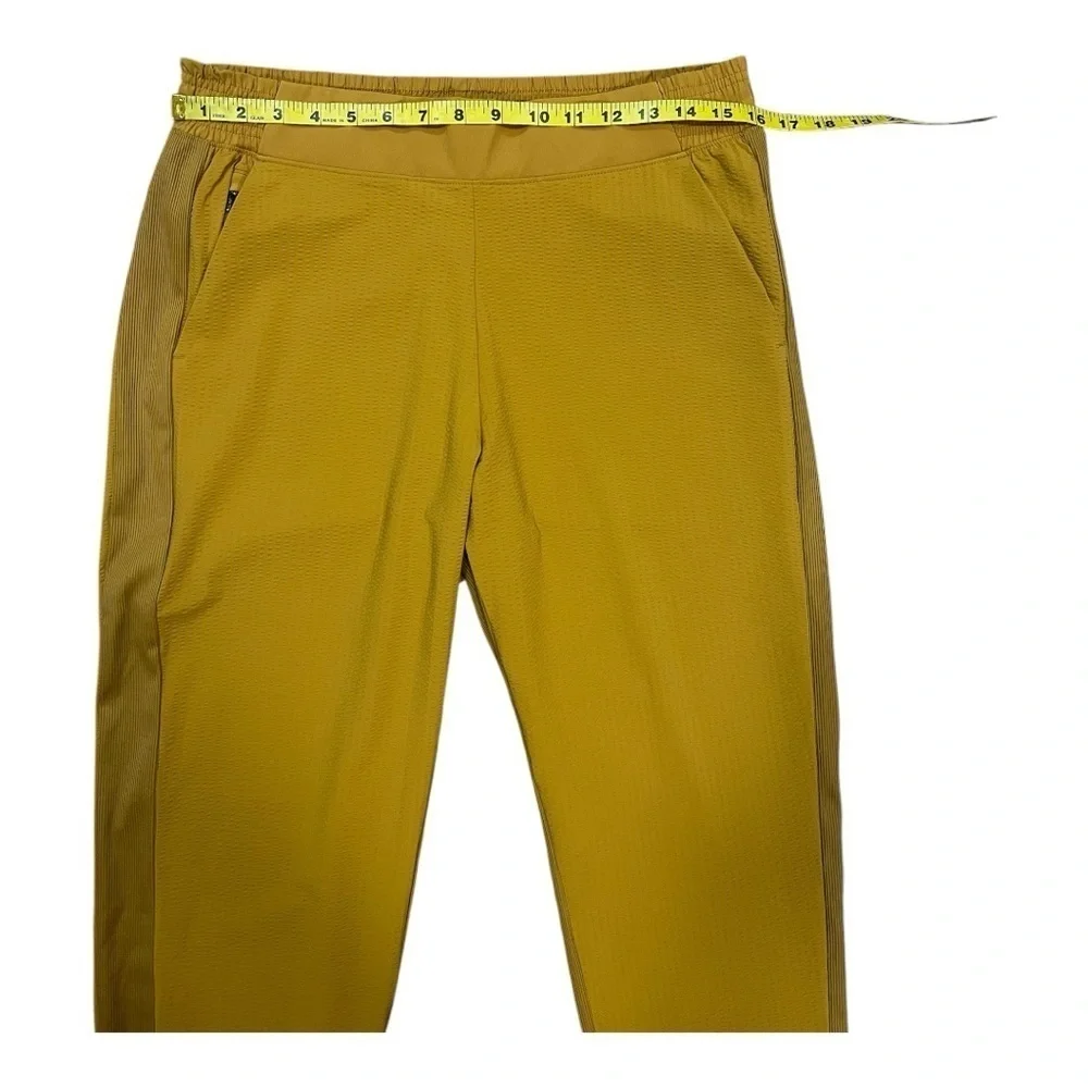 ATHLETA Brooklyn Joggers Women’s  NWOT Size 10 Gold